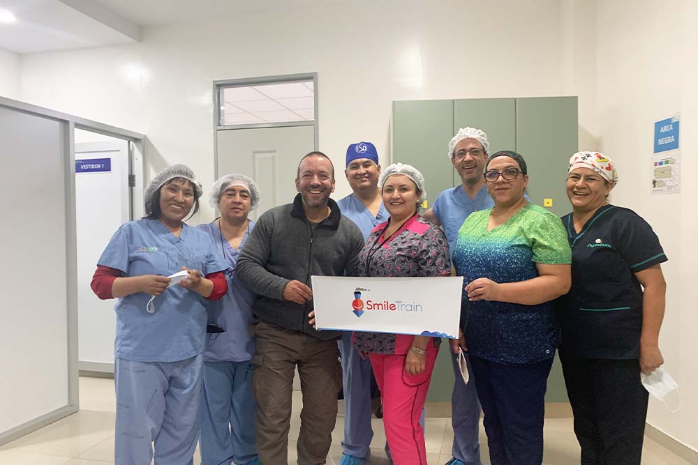 Iván poses with a Smile Train-sponsored medical team in Bolivia